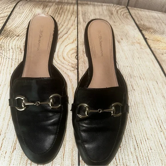 BCBGeneration Black Mules with Gold Accent - Picture 2 of 2